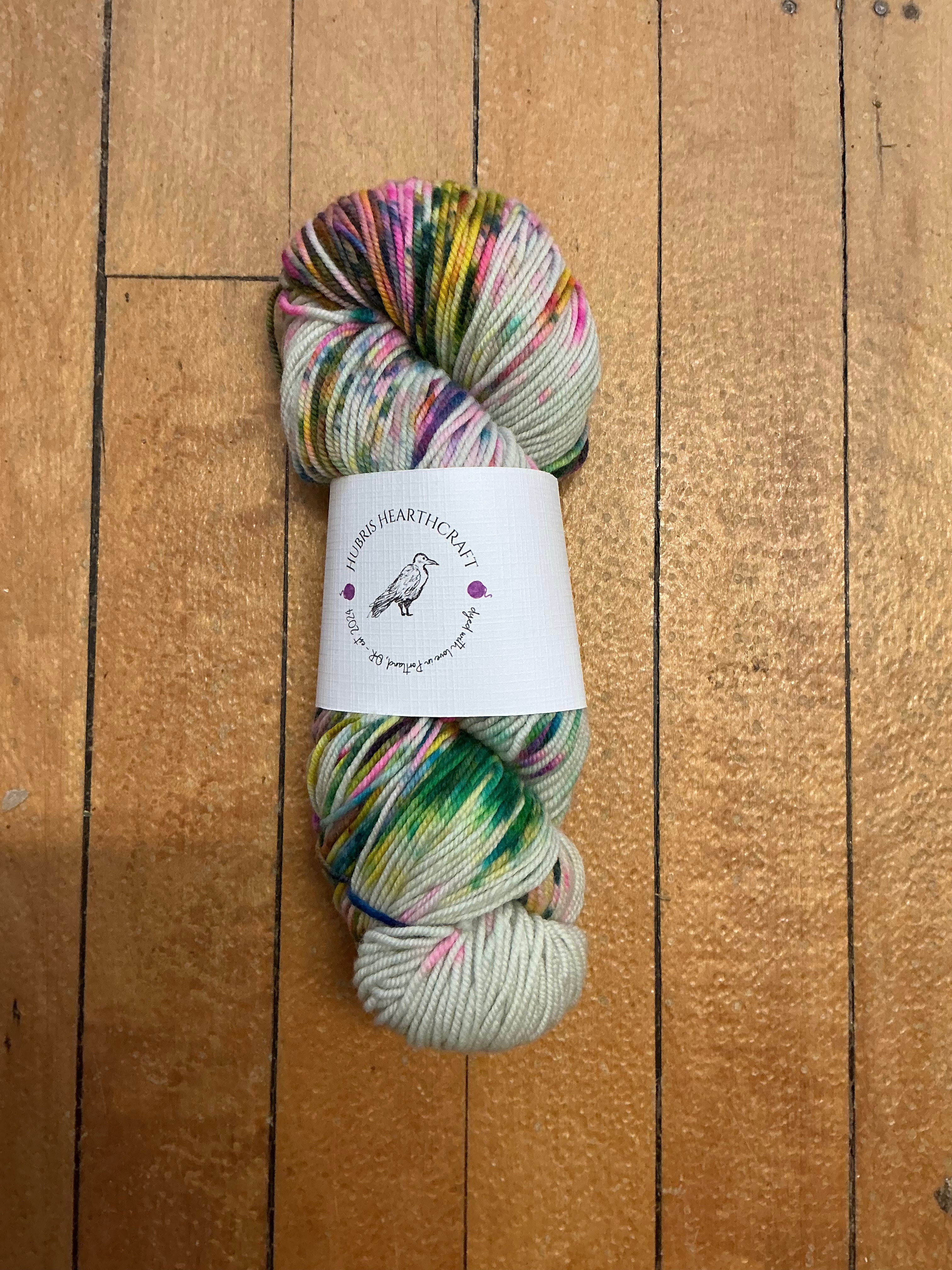 Hubris Hearthcraft Sock Between Grimoire Pages